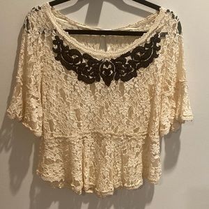 FREE PEOPLE sheer lace embroidered cream colored top. Bell sleeve. Size med. EUC